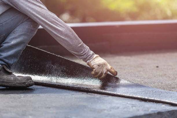 Professional Basement Waterproofing technician working in Port Reading, NJ